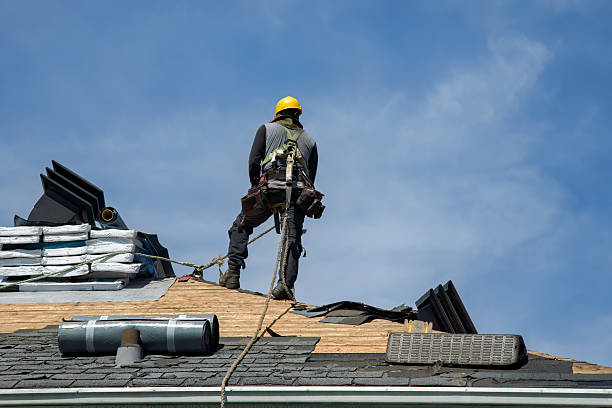 Professional Roof Repair technician working in North Clarendon, VT